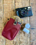 Will Hold This 5" x 3" x 1.75" Nikon + Two 35mm Film Canisters