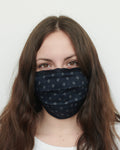 Bridget is wearing an indigo foulard pattern mask