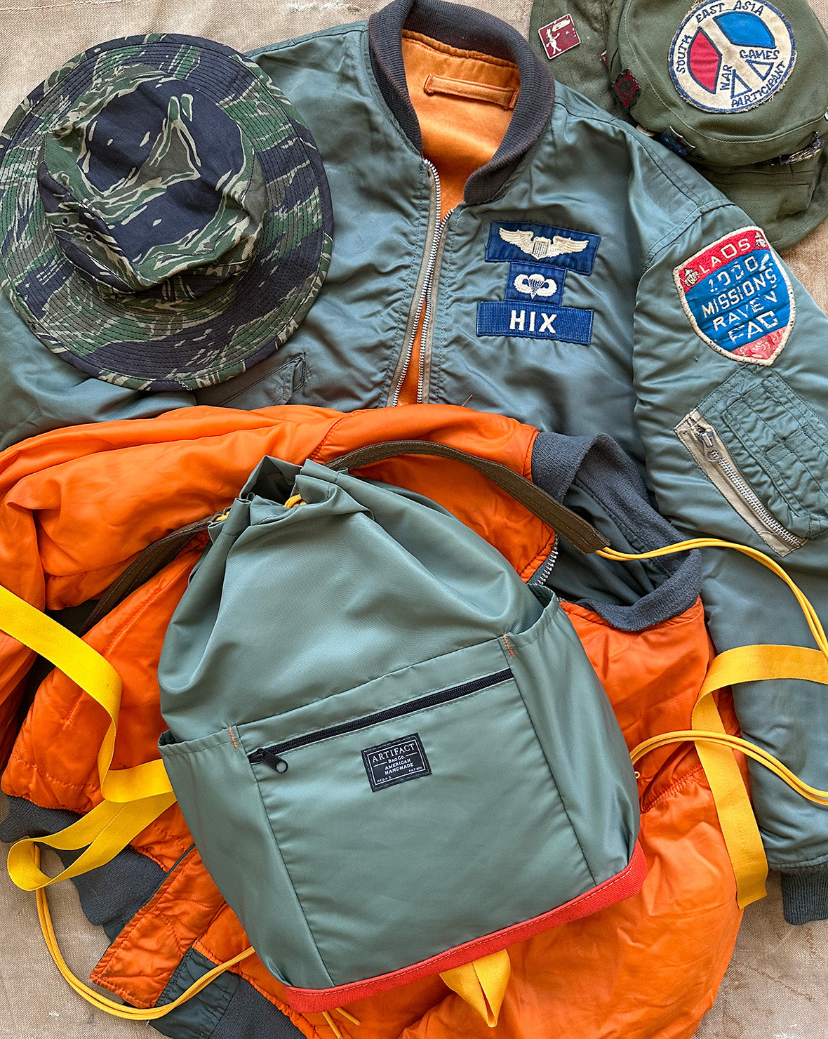 Military Drawstring Backpack Drawstring Cinch Backpack in Military Flight Jacket Satin | ARTIFACT ...
