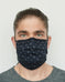 Alec is wearing an indigo foulard pattern mask