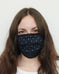 Bridget is wearing an indigo foulard pattern mask